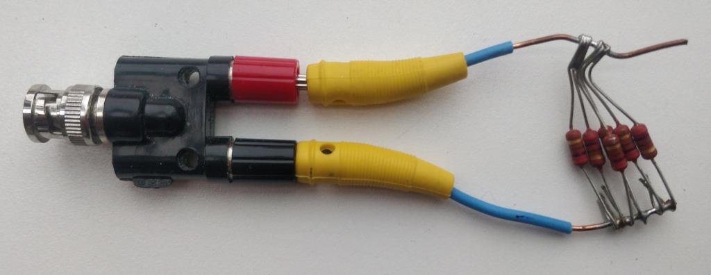 QRP dummy load consisting of an adapter BNC to banana sockert, two
banana plugs with about 5 cm wire each, and 7 resistors soldered to
those wires in parallel